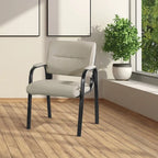 Sillón para invitados de piel sintética y estructura con acabado negro
