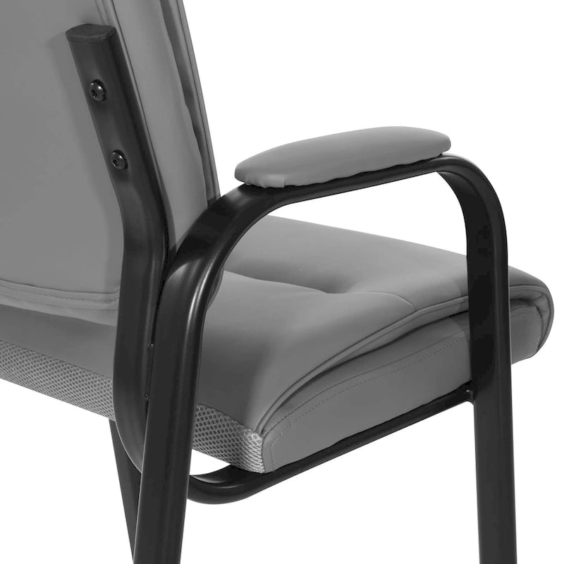 Sillón para invitados de piel sintética y estructura con acabado negro