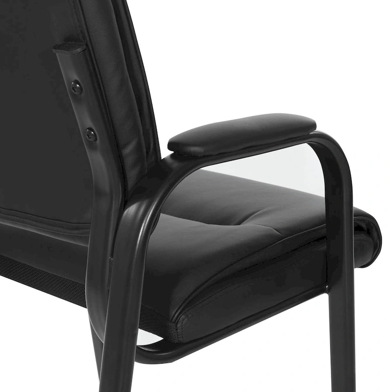 Sillón para invitados de piel sintética y estructura con acabado negro